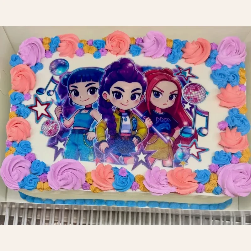 Character-print custom sheet cake decorated with pastel rosettes