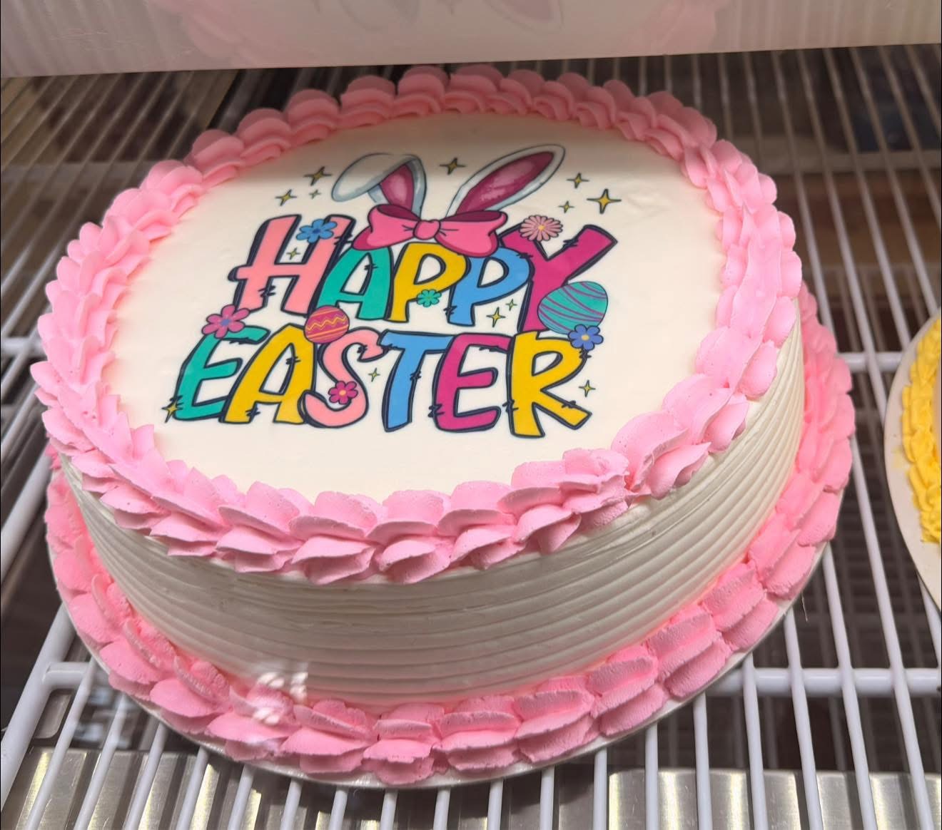 Happy Easter custom cake with pink frosting borders