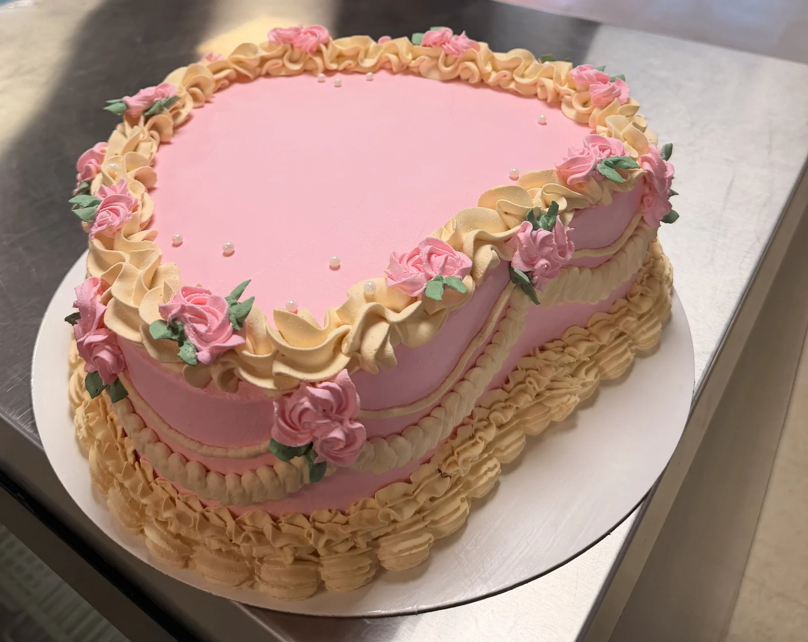 Heart shaped frosted cake