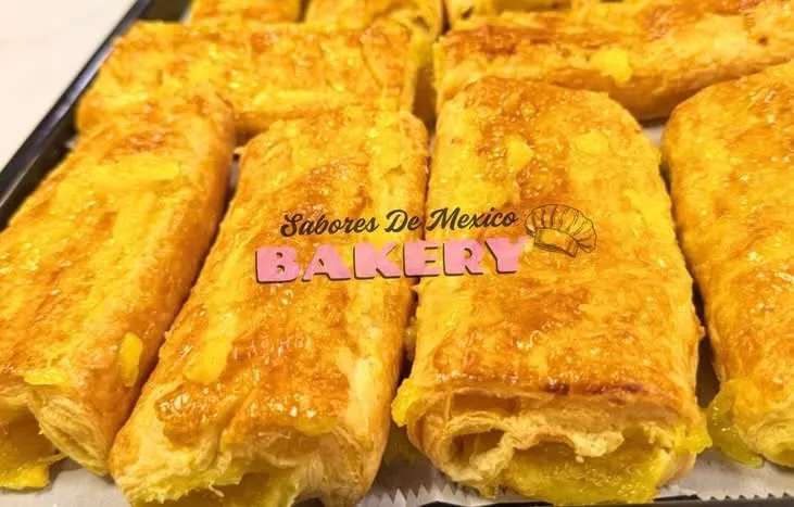 Golden baked sweet empanadas filled with sweet pineapple jam