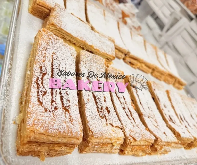 Flaky puff pastry bread dusted with powdered sugar