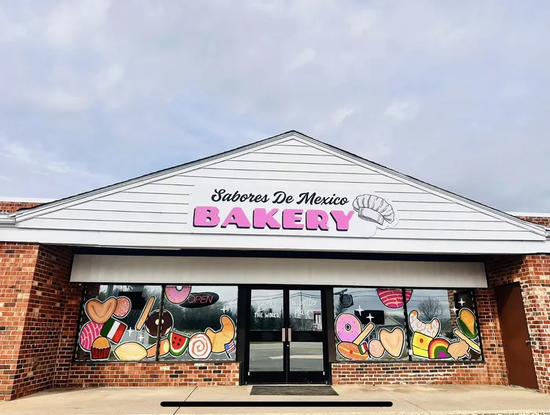 Sabores de México Bakery storefront exterior with colorful painted murals